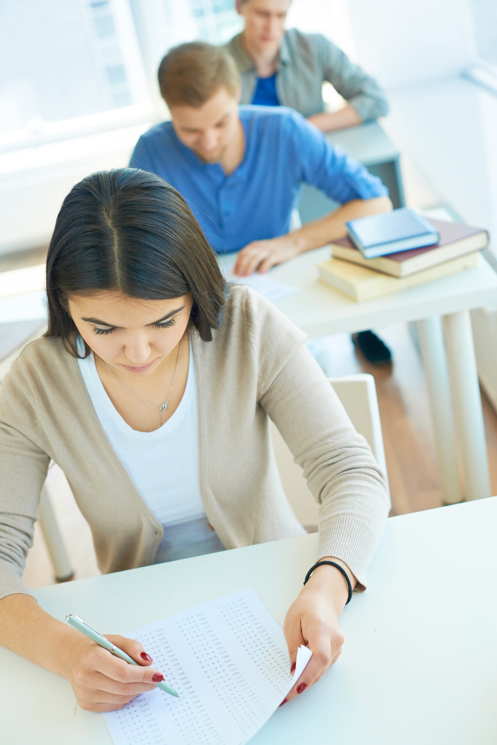 girl-checking-her-exam-min